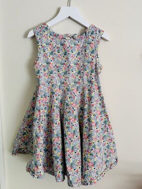 Girls' Sleeveless Floral Twirl Dress in Multi-Color